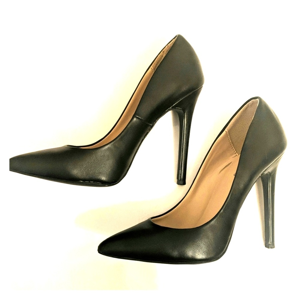 Black leather pumps